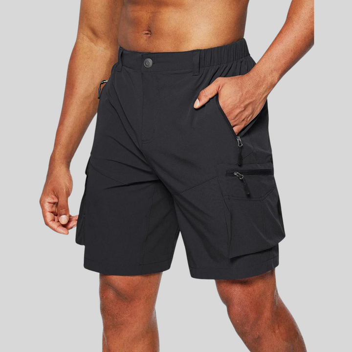 Black cargo shorts featuring zip pockets and adjustable elasticated waist