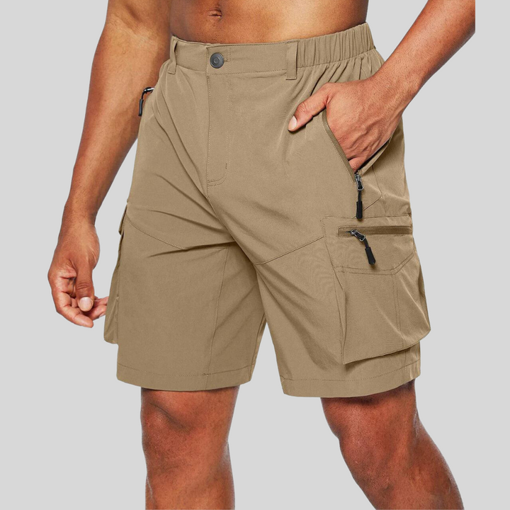 Sand beige cargo shorts with multiple zip pockets and stitched panels