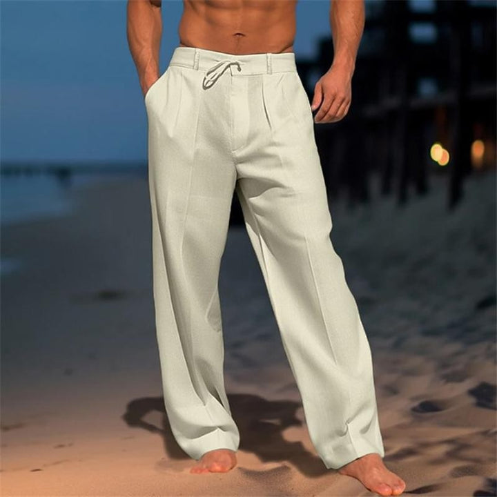 Off-white wide-leg men's trousers with pleated front and drawstring waist detail