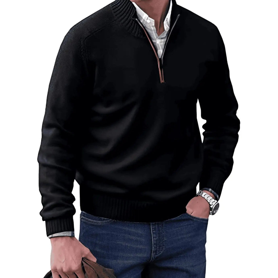 Black quarter-zip jumper with brown-trimmed zip and ribbed collar