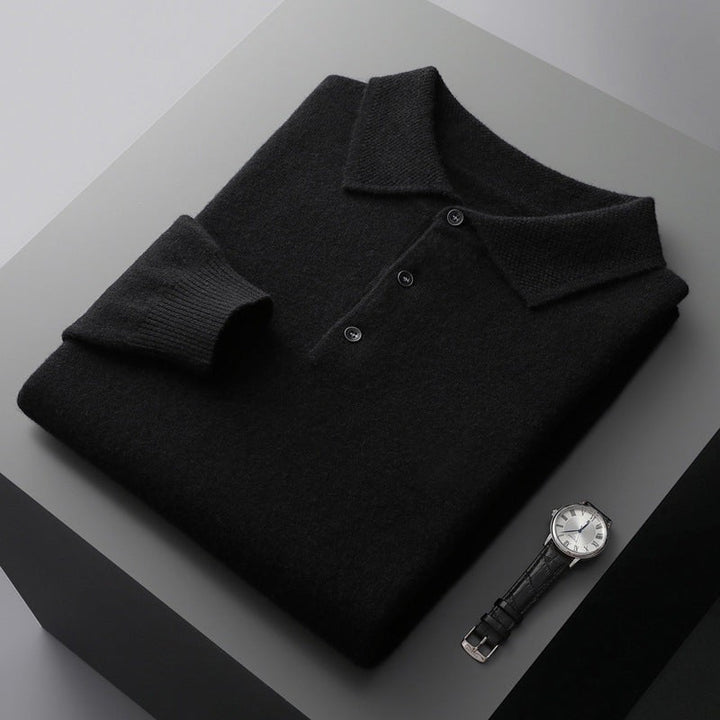Black knitted polo jumper folded showing button fastening and cuff rib