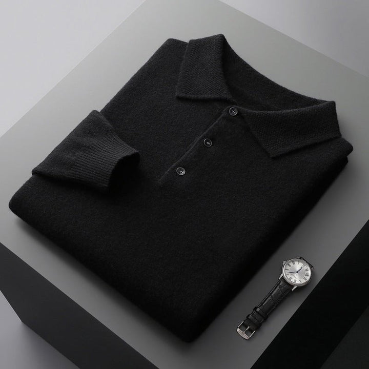 Black knitted polo jumper folded with textured collar and button fastening