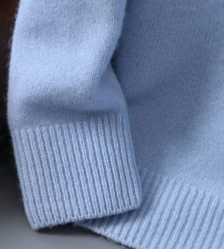 Ribbed cuff detail on pale blue long sleeve knitted jumper
