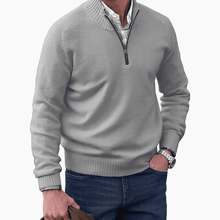Light grey half-zip knit jumper with ribbed hem and mock neck