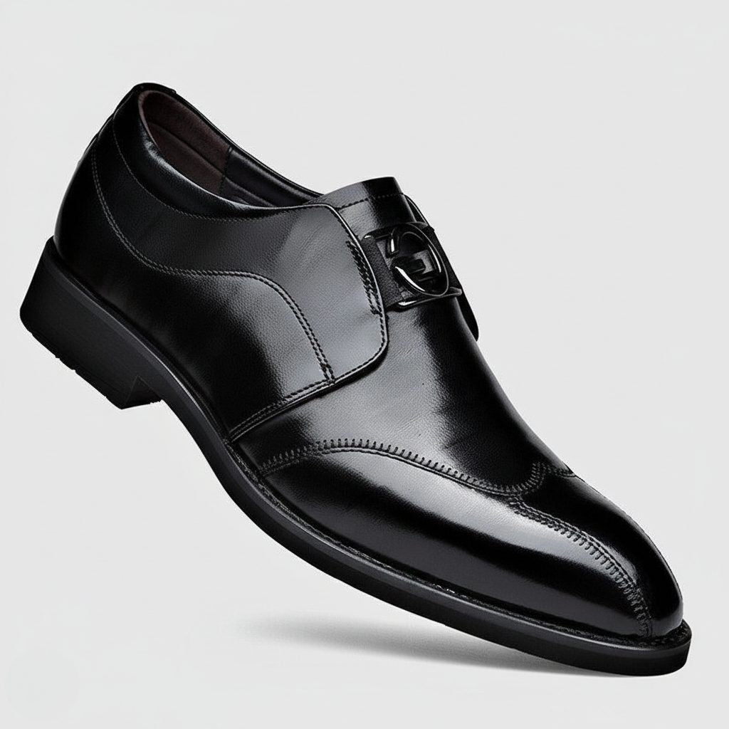 Black leather monk strap shoe with glossy finish and pointed toe