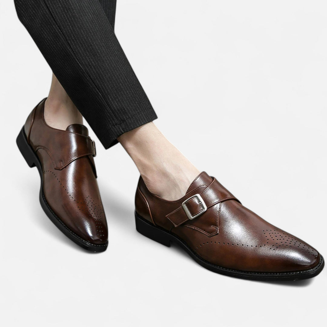 Man wearing brown leather monk strap shoes paired with pinstripe trousers