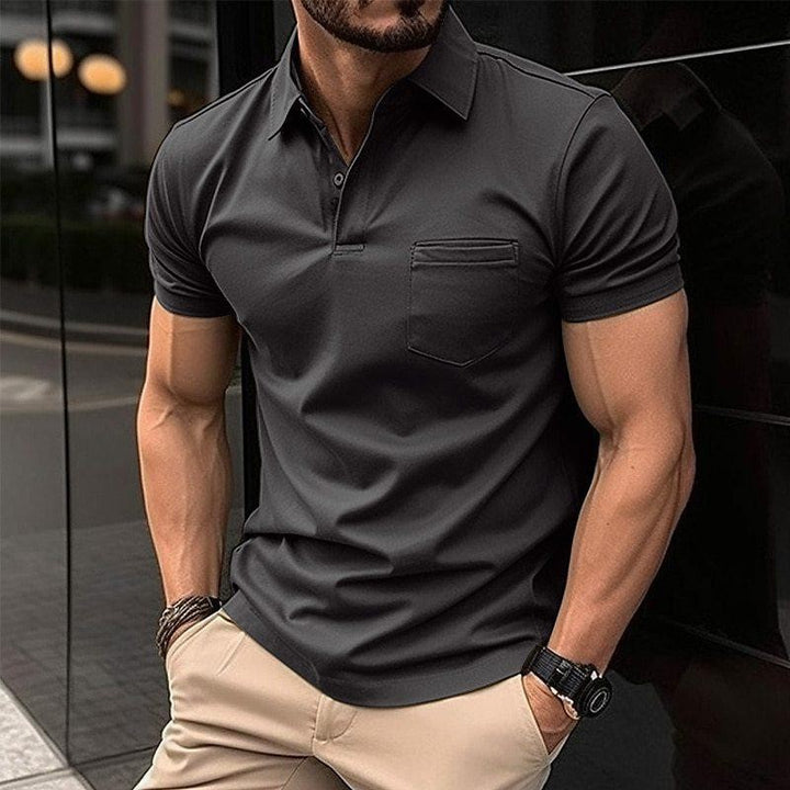 Charcoal grey slim-fit men's polo shirt with chest pocket and collar