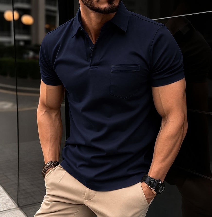 Navy blue short-sleeve polo shirt styled with beige trousers and collar detail