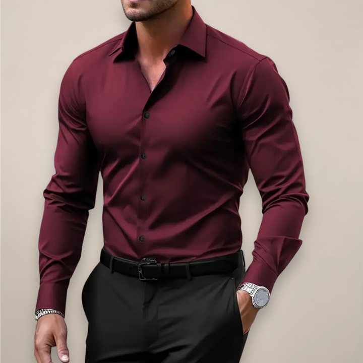 Burgundy long sleeve smart shirt worn with black tailored trousers