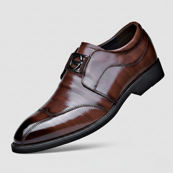 Brown leather monk-strap dress shoe with buckle detail and pointed toe