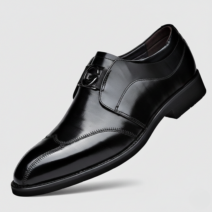 Black leather monk-strap dress shoe with buckle fastening and pointed toe