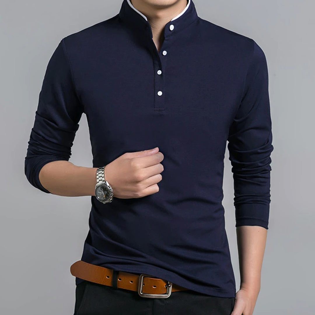 Navy long-sleeve polo shirt showing stand collar and white button trim