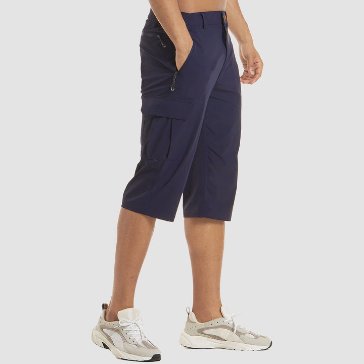 Navy cargo shorts side view highlighting zip pocket and cropped leg length