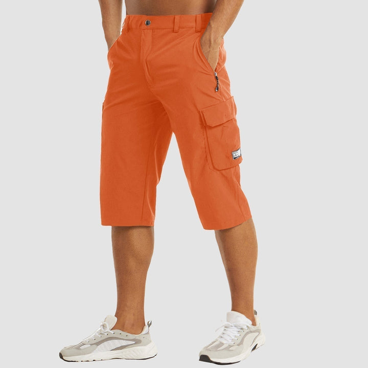 Burnt orange cropped cargo shorts with cargo pocket and popper waist tab