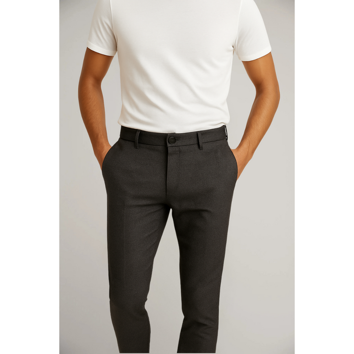 Charcoal grey tailored slim leg trousers with tapered fit and belt loops