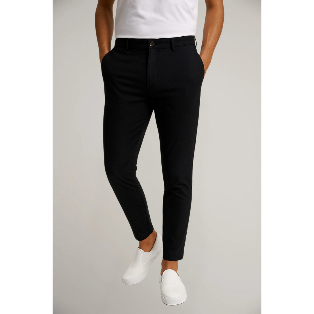 Black slim leg tailored trousers paired with white t-shirt and slip-ons