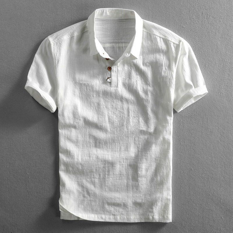 White linen short sleeve polo shirt with textured weave and button neckline