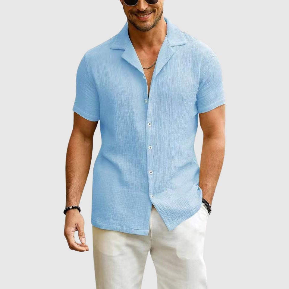 Sky blue textured linen shirt with camp collar and short sleeves
