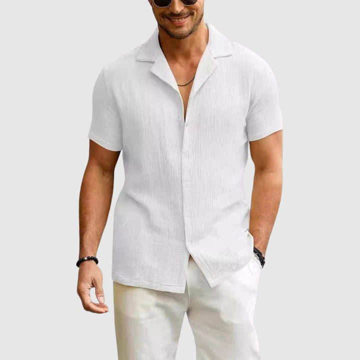 White crinkled linen shirt with relaxed fit and camp collar