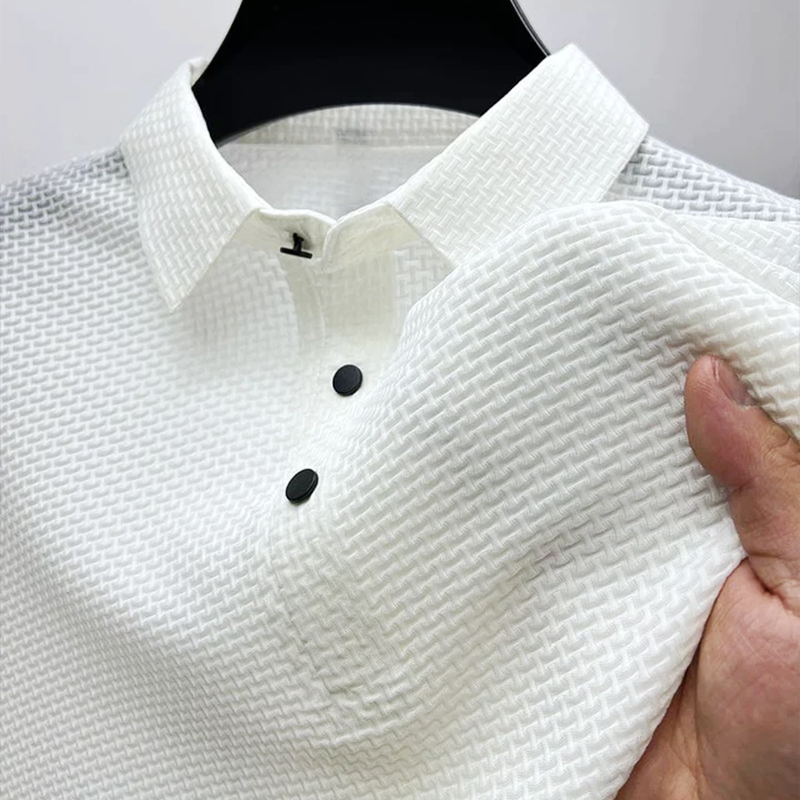 White men's polo shirt featuring textured weave pattern and pointed collar