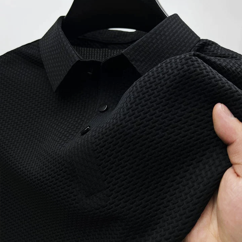 Black men's polo shirt with subtle woven texture and classic collar