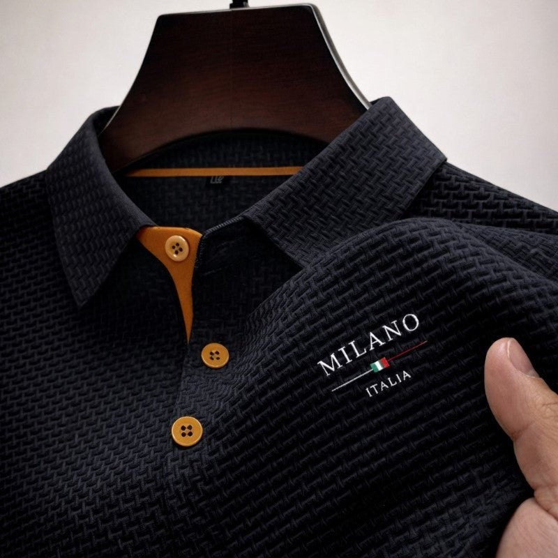 Black textured polo shirt with tan buttons and Milano Italia embroidered logo