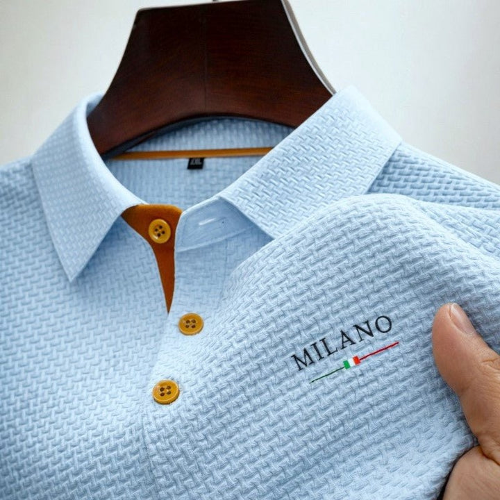 Light blue basketweave polo shirt featuring contrast tan button placket detail