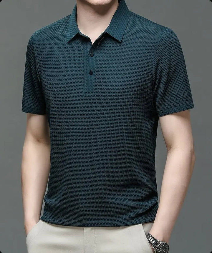 Teal textured knit polo shirt worn with short sleeves and collar