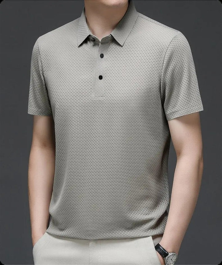 Sage green textured knit polo shirt with classic collar and short sleeves