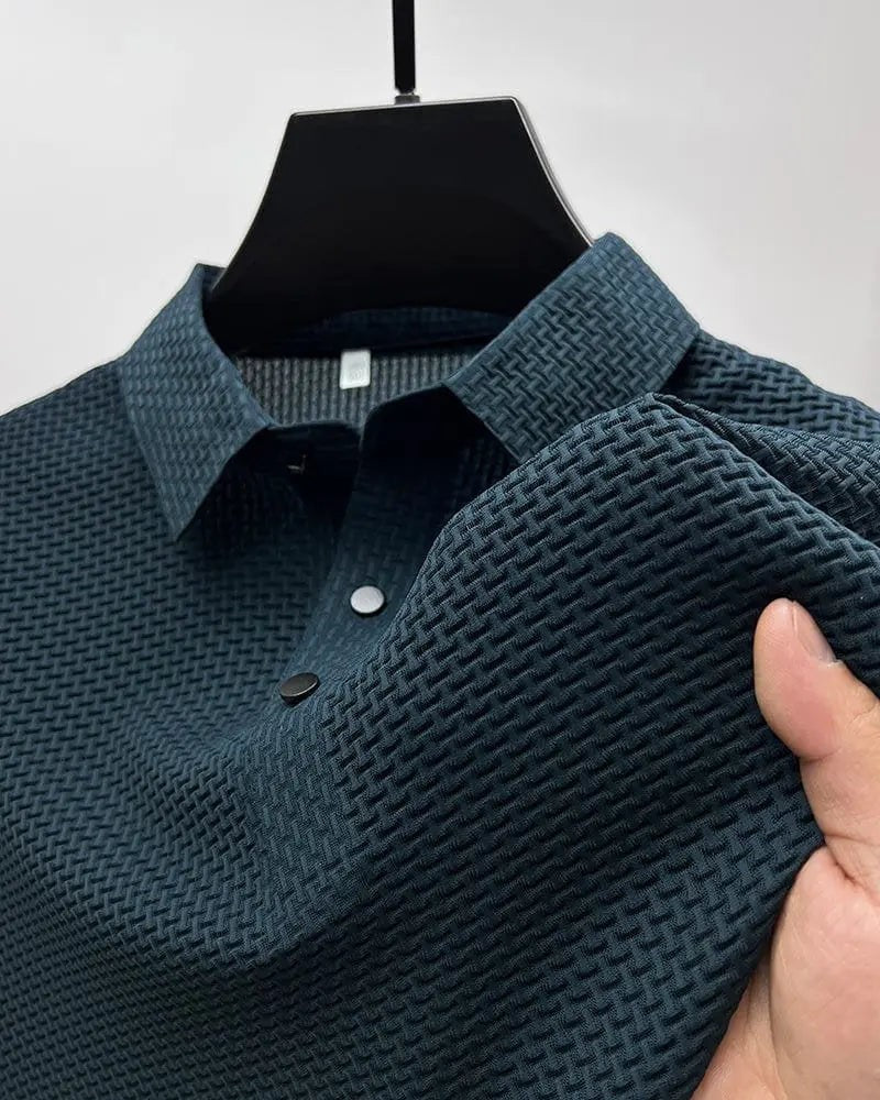 Navy textured knit polo shirt on hanger highlighting woven fabric detail