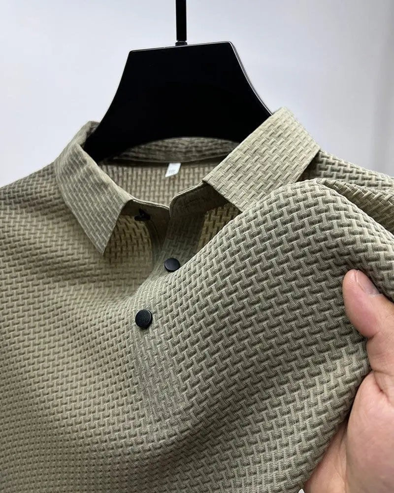Khaki textured knit polo shirt on hanger showcasing basketweave texture