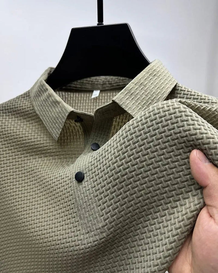 Khaki textured knit polo shirt on hanger showcasing basketweave texture