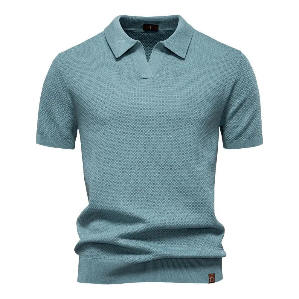 Duck egg blue knitted polo shirt with short sleeves and open collar