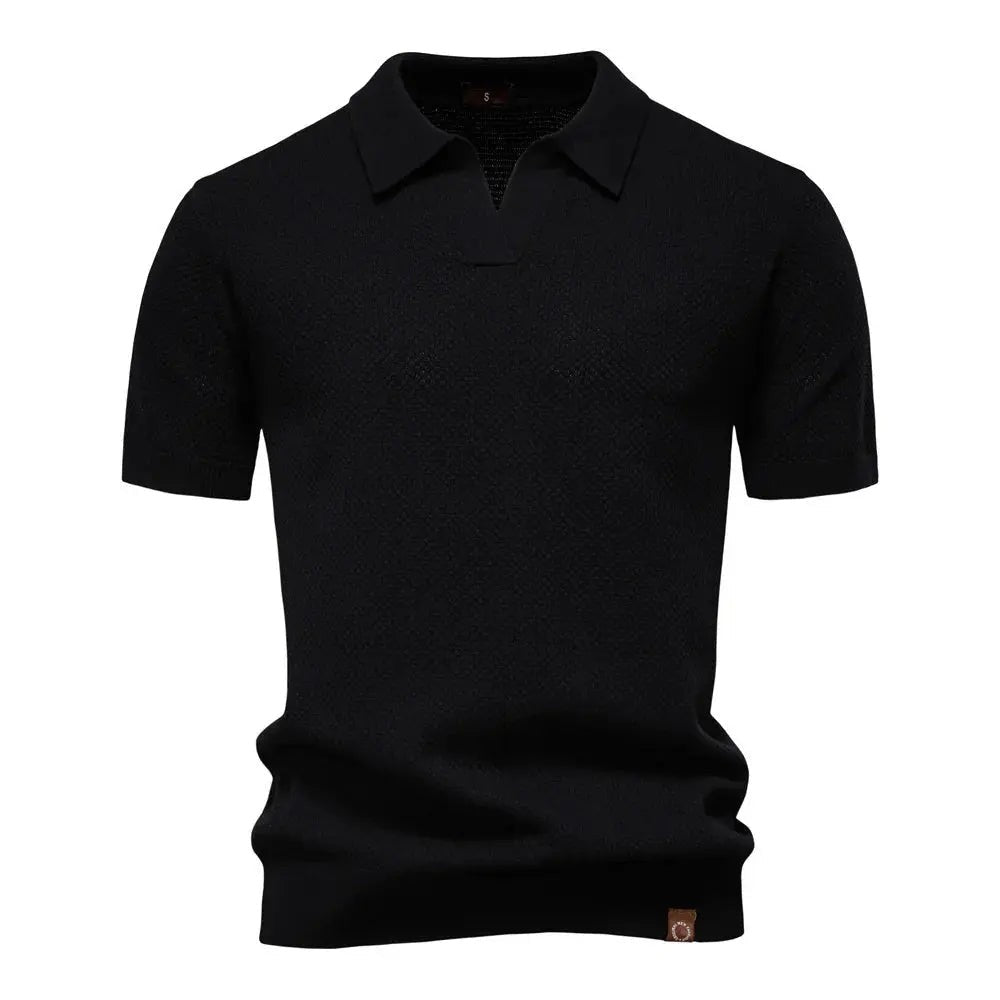 Black textured knit polo shirt featuring collared buttonless V-neck design