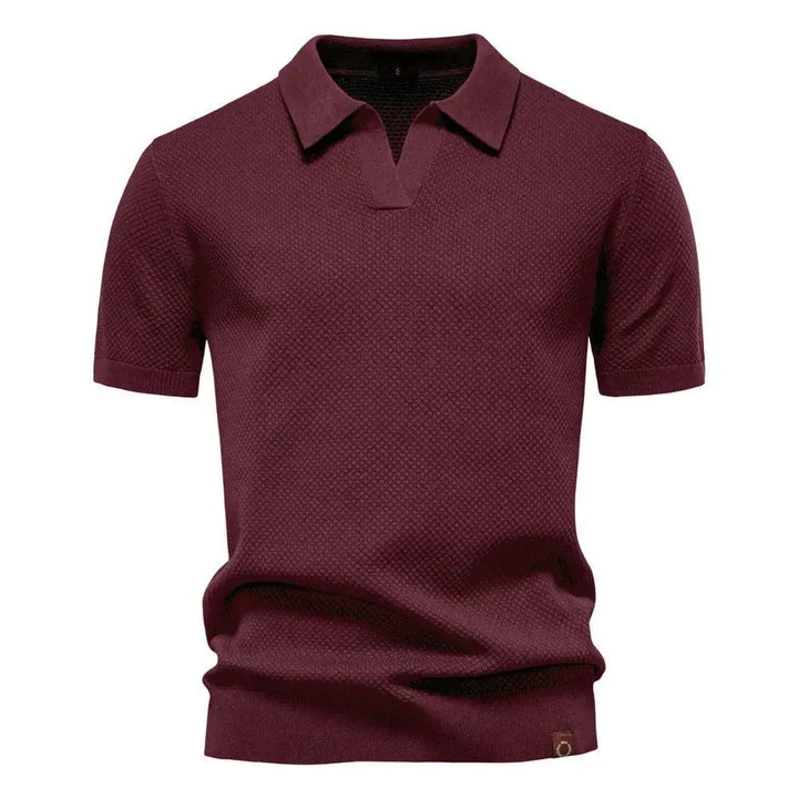 Burgundy textured polo shirt with buttonless V-neck and ribbed cuffs