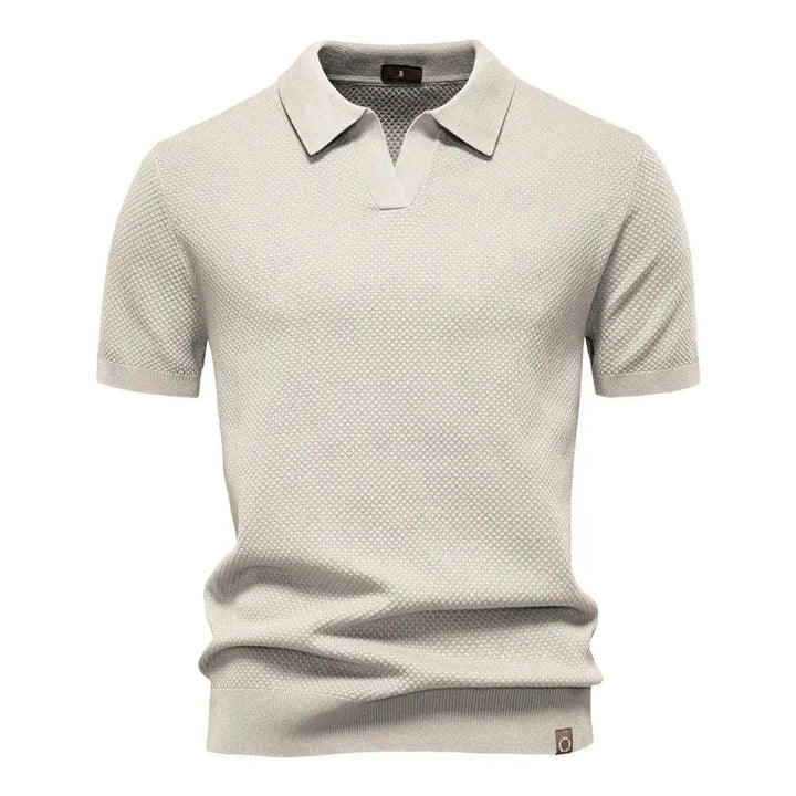 Beige textured knit polo shirt with buttonless V-neck detailing