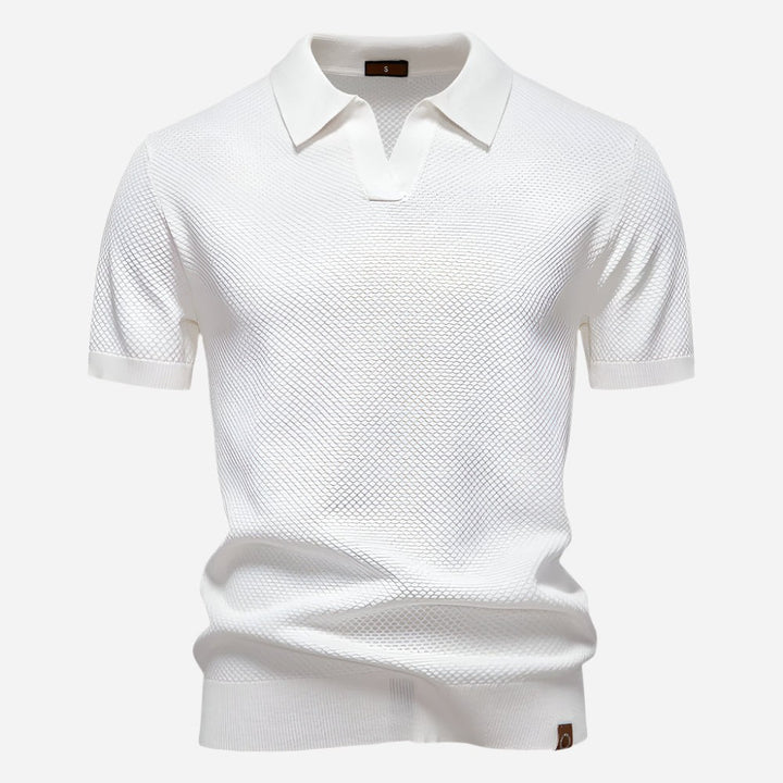 White textured knit polo shirt with open collar and short sleeves