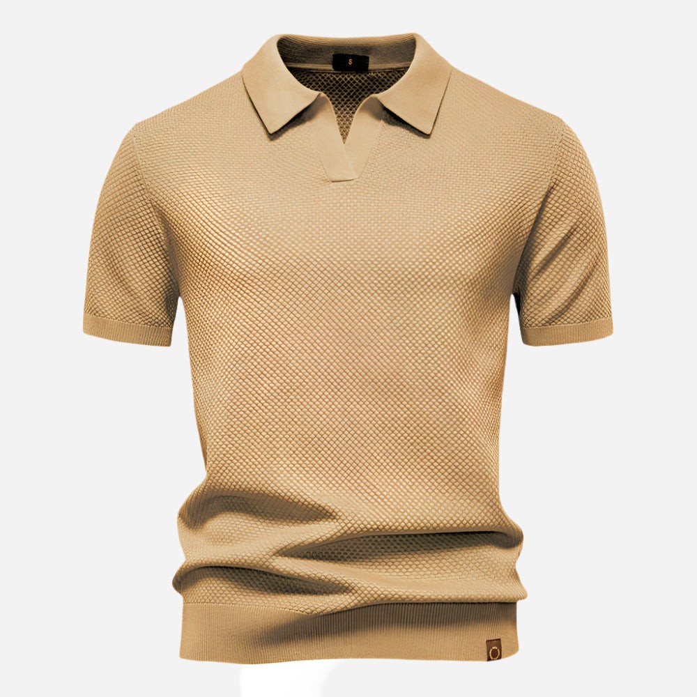 Beige knit polo shirt showing subtle woven diamond pattern