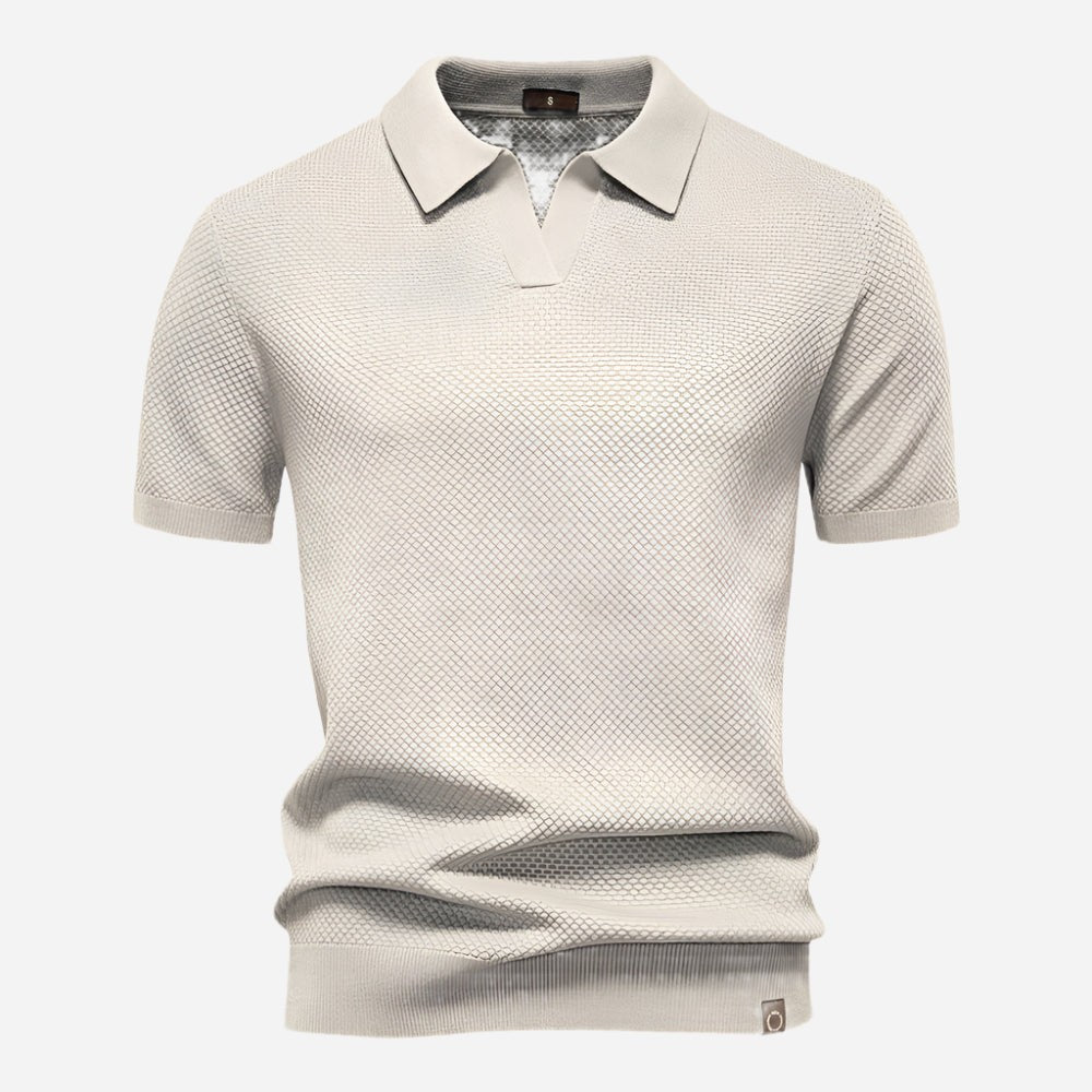 Cream textured knit polo shirt with open collar and short sleeves