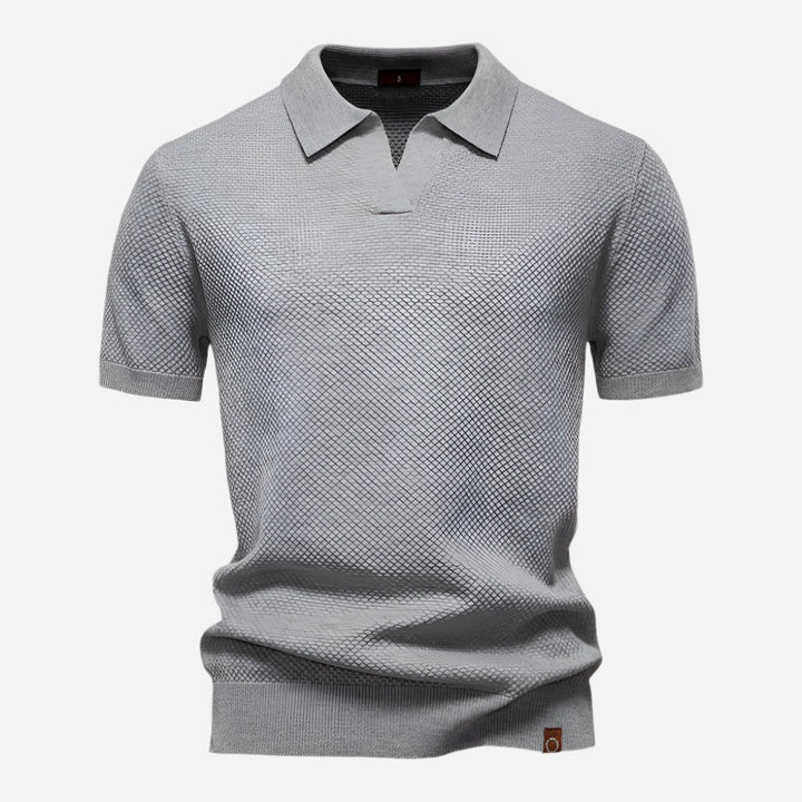 Grey marl knit polo shirt with open collar and short sleeves