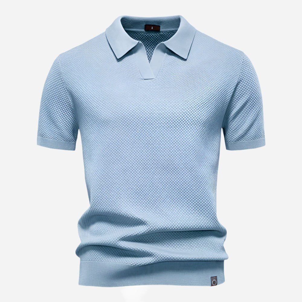 Pale blue knitted polo shirt with textured fabric and collar