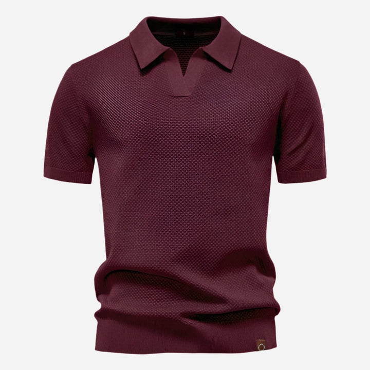 Burgundy knitted polo shirt with open collar and fine texture