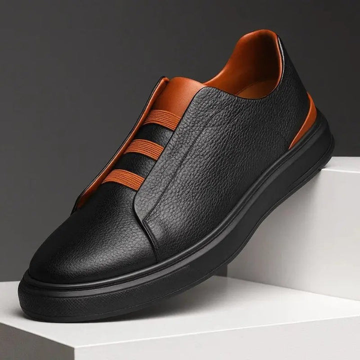 Black pebbled-leather slip-on trainers featuring tan elastic loop lacing detail