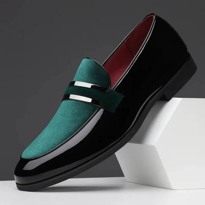 Black patent loafer with green suede toe and silver-tone buckle detail