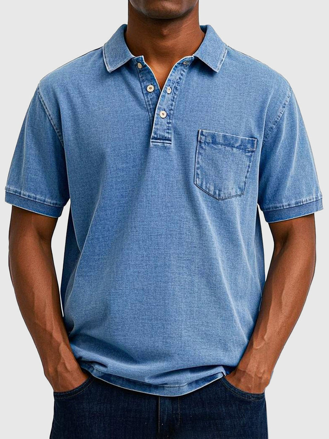 Light blue washed denim polo shirt with chest pocket and short sleeves