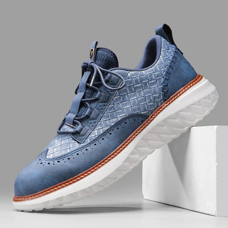 Men's navy woven-panel leather trainers with brogue detailing and white platform sole