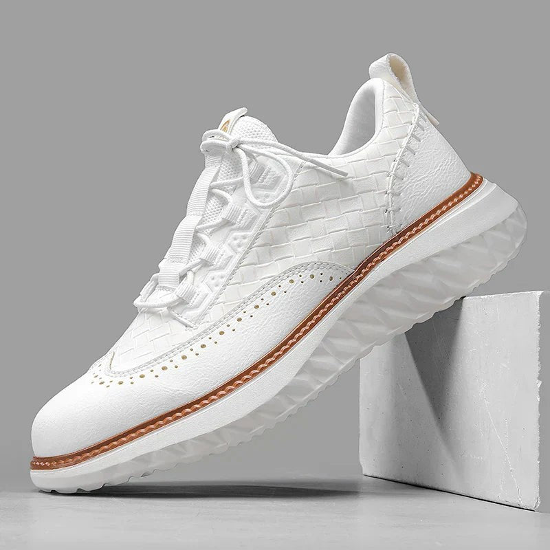 White woven leather lace-up trainers featuring brogue perforations and tan-stitched sole