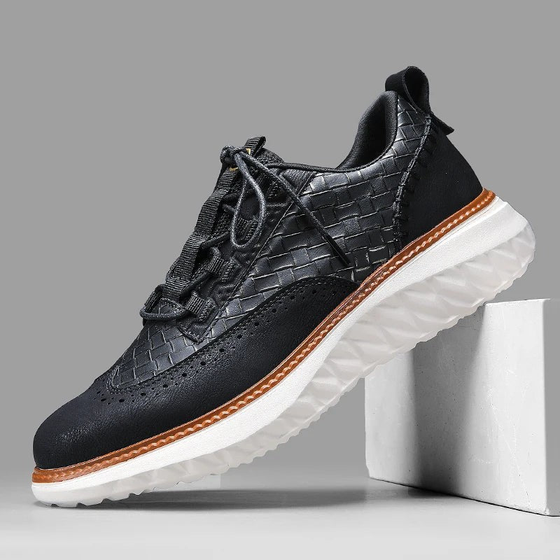 Black woven leather lace-up trainers with brogue perforations and chunky white sole