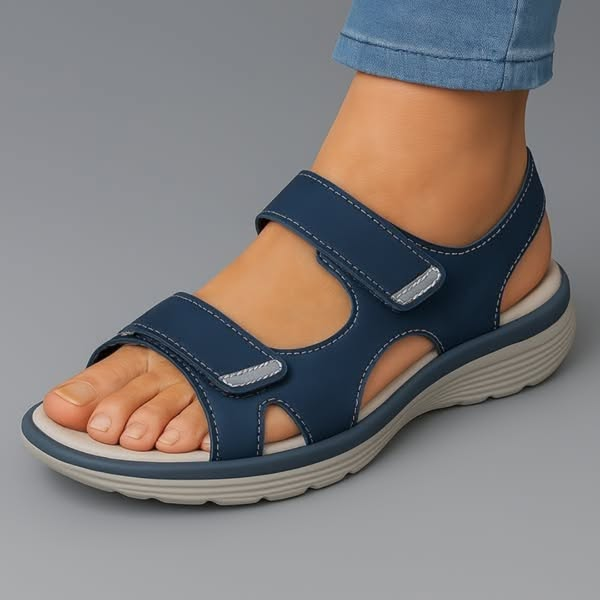 Navy blue orthopaedic sandals with adjustable double touch-strap fastening and cushioned wedge sole