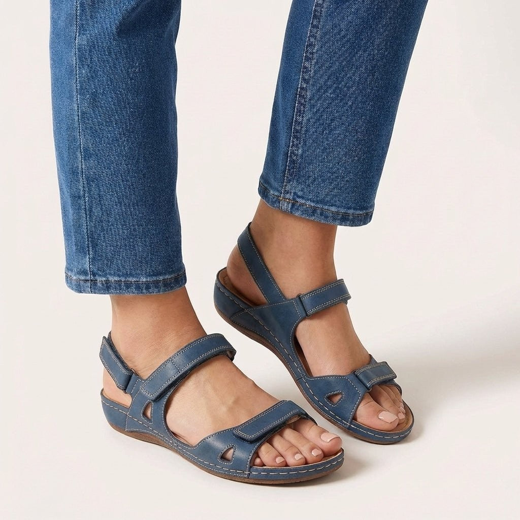 Blue leather orthopedic sandals with adjustable Velcro straps and open toe